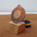 Медаль MA1550 Бронза зі стрічкою D50мм місце під жетон Д25мм